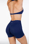 Kikiva Dynamic Halter Twist Crop- Dark Blue